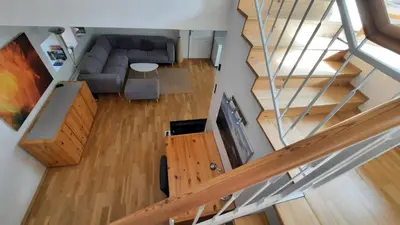 an overhead view of a living room with a couch at Apartmán Franz Josef in Hošťka