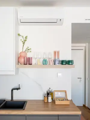 a kitchen with a sink and a counter top with a sink at Urban Chic Residences in Prague