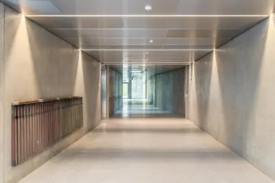 a corridor of an office building with a long hallway at Urban Chic Residences in Prague