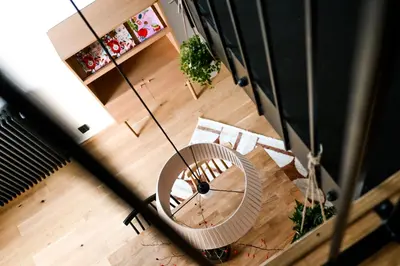an overhead view of a living room with a table at Resort po.spolu in Mokrovraty
