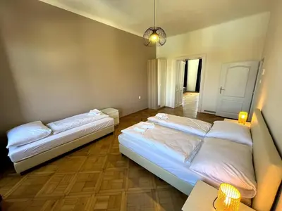 a bedroom with two beds in a room at Katerina's Downtown Apartments in Prague