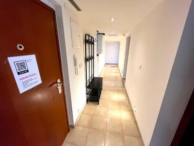 a hallway with a stairway in a building at Katerina's Downtown Apartments in Prague