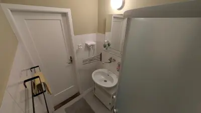 a small bathroom with a toilet and a sink at Flat in Zizkov -403- in Prague