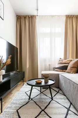 a living room with a couch and a coffee table at TurnKey I Republic Square Apartments in Prague