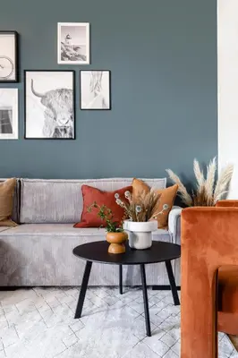 a living room with a couch and a table at TurnKey I Republic Square Apartments in Prague