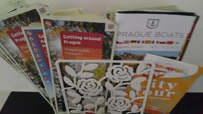 a group of books sitting on top of a table at Bastien Studio near Airport in Prague