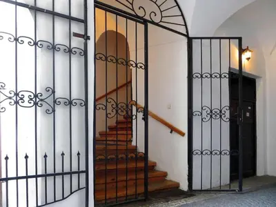 an open gate with a staircase in a building at Apartment Old Town home-4 by Interhome in Prague