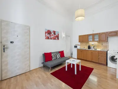 a living room with a couch and a table at Apartment Old Town home-4 by Interhome in Prague