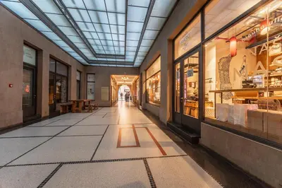 a hallway of a store with a glass ceiling at A Prague Apartment - Old Town in Prague