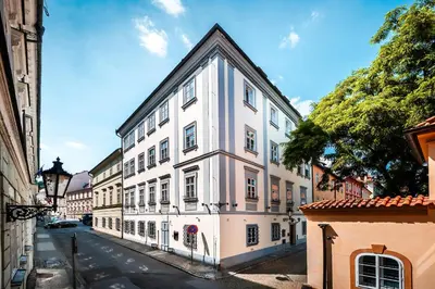 a white building on the side of a street at Nosticova Heritage in Prague