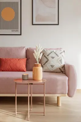 a living room with a couch and a table at Prague Days - Studio with Balcony in quiet and trendy Holešovice in Prague