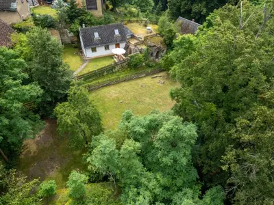 an aerial view of a house in the trees at Holiday Home U skály by Interhome in Horní Vidim