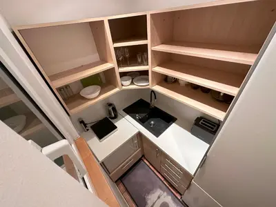 an overhead view of an empty kitchen in an rv at Castle View Apartments. Old Town in Prague
