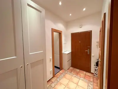 a room with a hallway with a door and a bathroom at Castle View Apartments. Old Town in Prague