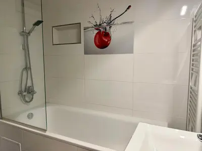 a kitchen with a black sink on a counter at Modern flat in Central Prague in Prague