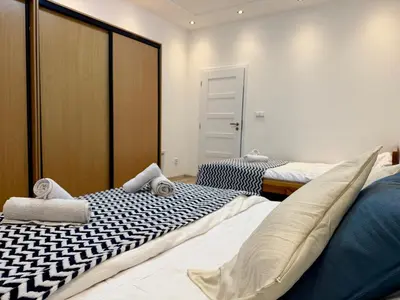 a bathroom with a shower and a bath tub at Modern flat in Central Prague in Prague