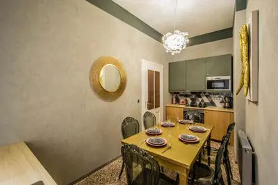 a dining room with a table and chairs at 3BDR Oasis in the heart of Prague in Prague