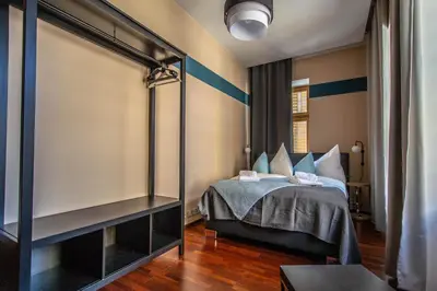 a bedroom with a bed in a room at Wooden Design 2BDR Apartment near Eden Garden in Prague