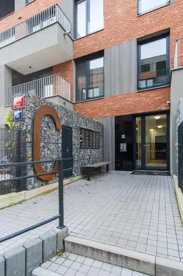 a building with a bench in front of it at Prague Days - Premium Apartments - Balcony in Prague
