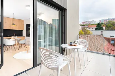a poster of a bedroom with a bed at Prague Days - Premium Apartments - Balcony in Prague