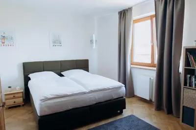 a white bathroom with a sink and a toilet at FamilyVilla, new 4 Luxury Big Apartments, parking in Prague