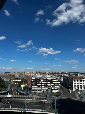 a view of a city with a highway and buildings at Mozart Apartments Prague in Prague