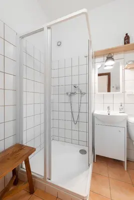 a bathroom with a shower and a sink at Penzion Dubina in Litoměřice