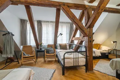 a bedroom with a loft bed and a bedroom with a bed at Charles Bridge Historical APTs by Michal&Friends in Prague