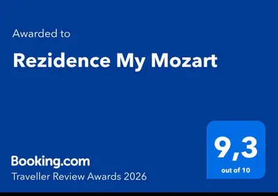 a blue screen with the words reliance mymant on it at Rezidence My Mozart in Prague