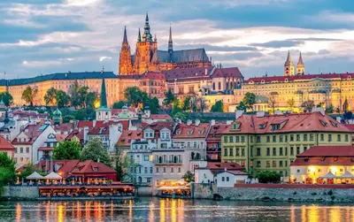 a view of a city with a river and buildings at Cozy Karlín Loft City Center in Prague