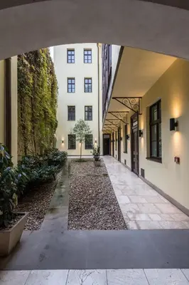 an internal view of a hallway in a building at Upscale apartments in prime location near all sights in Prague