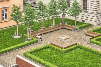 an aerial view of a garden with trees and a bench at Exclusive 2 bedroom apartment Old Town - 2 baths, balcony and view - by Prague City Apartments in Prague