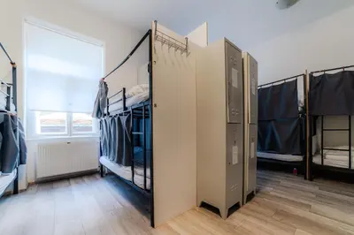a walk in closet with a row of closets at Hostel Comfort in Prague
