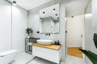 a white bathroom with a sink and a toilet at Rentero Cozy Wenceslas square 700m Apartment, Prague in Prague