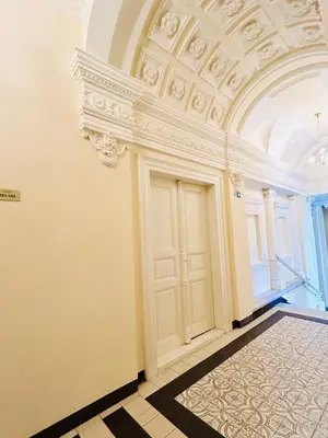 an empty room with a door and a ceiling at NEW DESIGN & STYLE Apartments 50m from Wenceslas Square in Prague