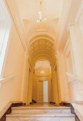 an empty hallway in a building with a ceiling at NEW DESIGN & STYLE Apartments 50m from Wenceslas Square in Prague
