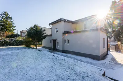 a house with a driveway in front of it at Apartmán Praha in Prague