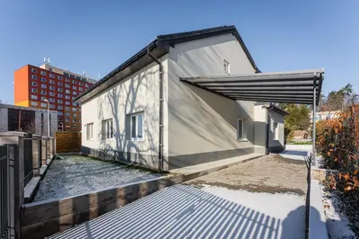 a building with an open door on the side of it at Apartmán Praha in Prague