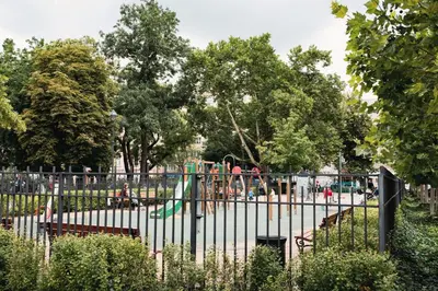a playground in a park with a playground at K-14 Apartment in Prague
