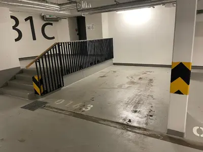 an empty room with a staircase in a building at Apartment 4 Room, 2 Bath, Parking in Prague