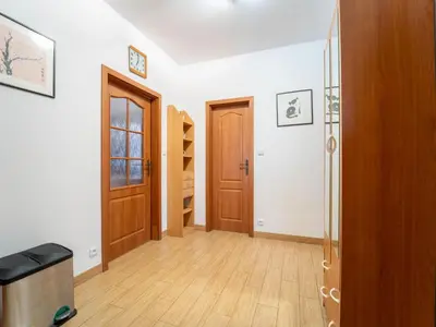 an empty room with wooden doors and a hallway at Holiday Home Vrbová Lhota U Aničky by Interhome in Vrbová Lhota