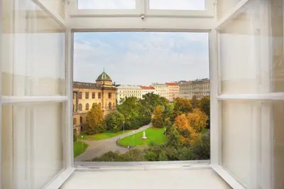 an open window with a view of a city at Wenceslas Square Hotel - Czech Leading Hotels in Prague