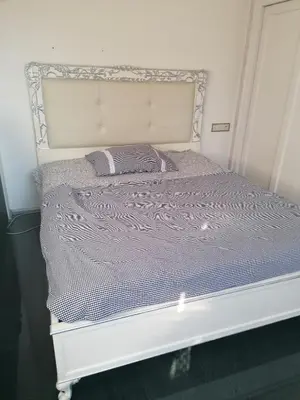 a white couch in a living room with a large window at Centrum luxury nice wiew, theras in Prague