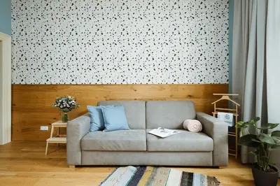 a living room with a couch and a wall at Dream blue in city centreWenceslas Sq in walk in Prague