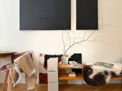a cat laying on a bed with a christmas hat on it at Chic Prague Apartment in Prague