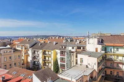 an aerial view of a city with buildings at Modern Attic with Terrace - machova in Prague