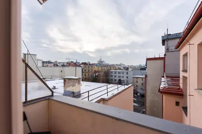 a view of a city from a balcony at Bellagio Apartment in Prague