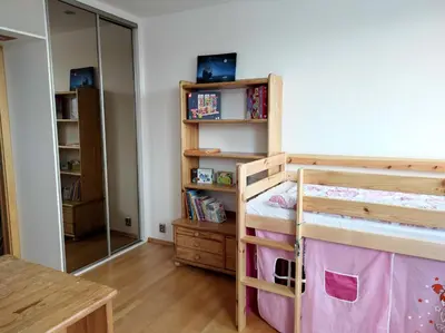 a bedroom with a bunk bed and a mirror at Very comfortable flat for the whole family in Prague