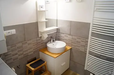 a bathroom with a sink and a mirror at U Koniáše in Litoměřice