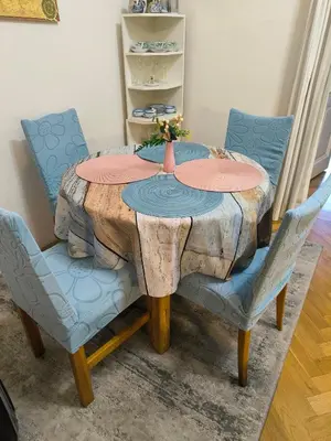 a dining room table with two chairs and a table with at Valentinka Minutes away from Charles Bridge in Prague